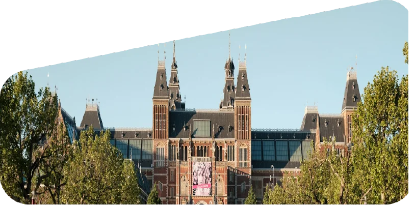 A grand museum surrounded by gardens